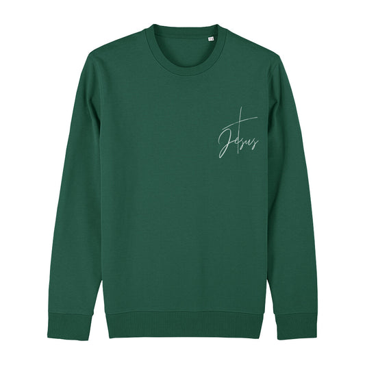 christliches Sweatshirt mit einem Unisex-Schnitt in dunkelgrün aus Bio-Baumwolle mit einem Kreuz und dem Schriftzug Jesus minimalistisch rechts auf der Brust. Erhältlich in den Größen XS bis XXL